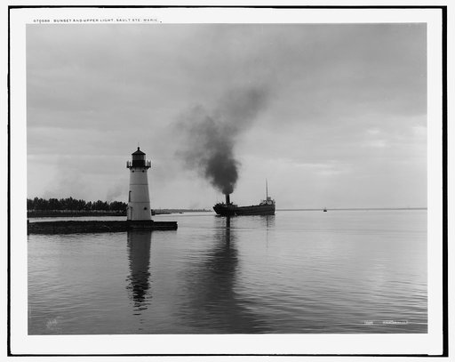 Sunset and upper light, Sault Ste. Marie, Mich.