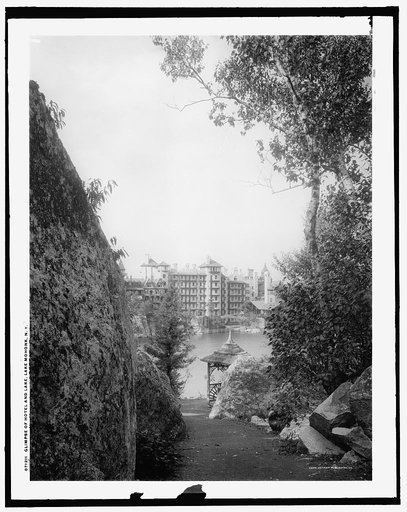 Glimpse of hotel and lake, Lake Mohonk, N.Y.