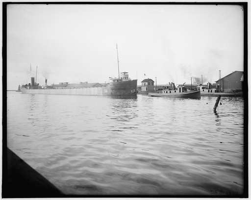 Towing in freighter Peter White, Cleveland, Ohio