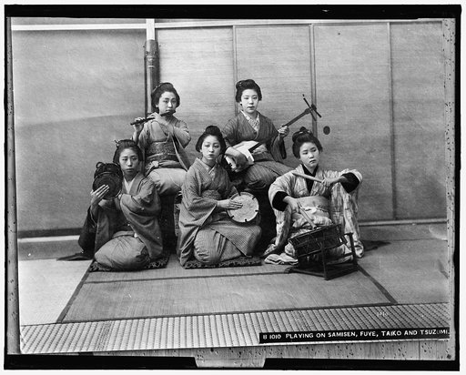Playing on samisen, fuye, taiko, and tsuzumi