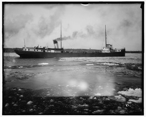 Freighter under steam, possibly Saint Marys River, Michigan