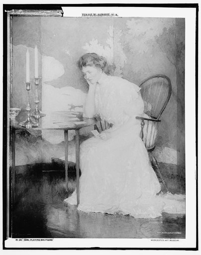 Girl playing solitaire