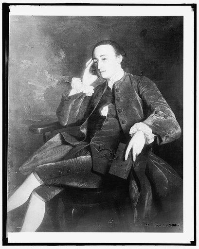 John Bours, seated in chair, full length portrait