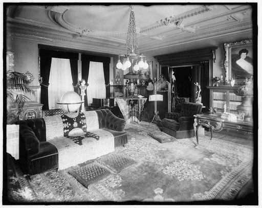 Living room with double windows and world globe