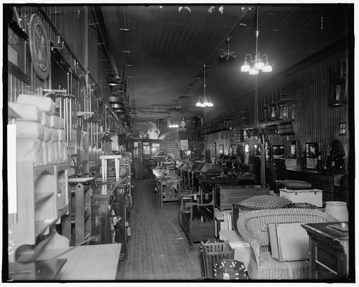 Furniture store interior, probably Detroit, Mich.