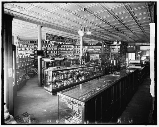 Store interior with Garland Agency stoves and ranges display, possibly Detroit, Michigan