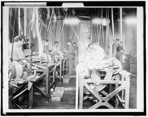 Factory workers assembling engines at Leland & Faulconer Manufacturing Co., Detroit, Mich.