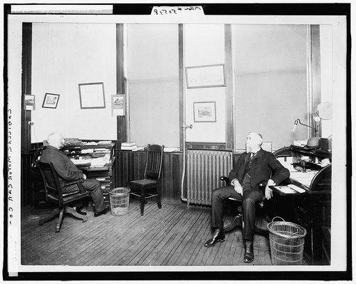 Henry Leland (right) and Robert Faulconer (left), in office at Leland & Faulconer Manufacturing Co., Detroit, Mich.