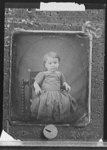 Girl, seated