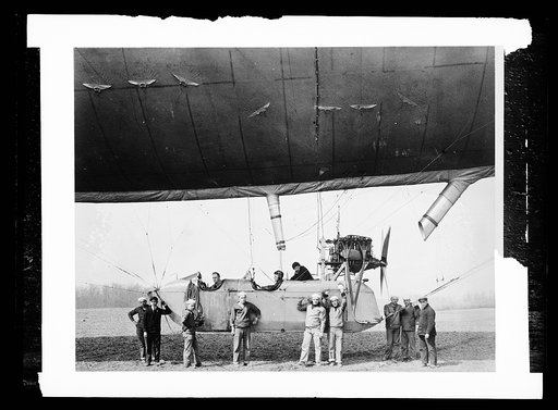 Group of men boarding an airship