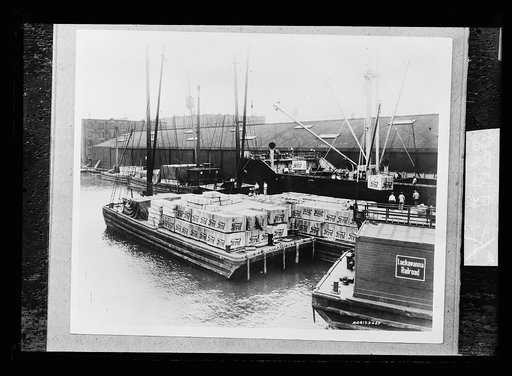 Freighter loading Ford cars