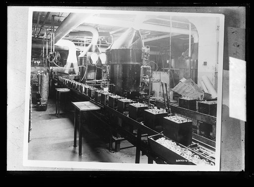 Automobile batteries on conveyor