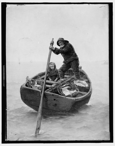Fisherman and girl aboard boat