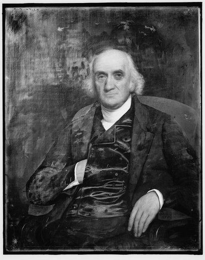 Old man seated in chair, half-length portrait
