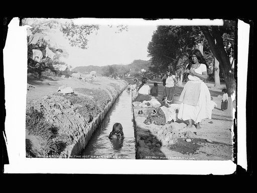 Bathing in the hot springs acequia