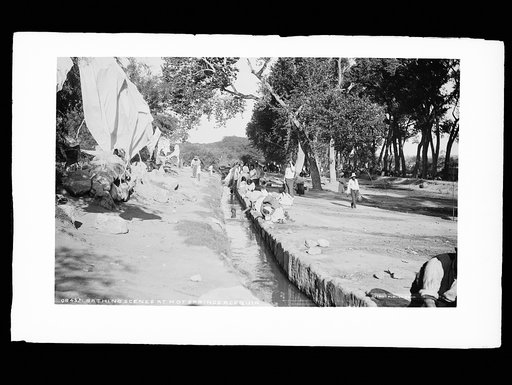 Bathing scene at hot springs acequia