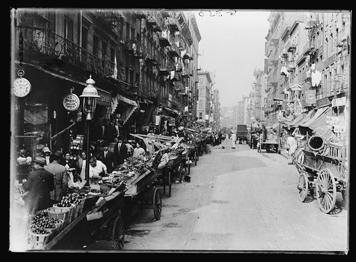 Italian neighborhood with street market, Mulberry Street, New York
