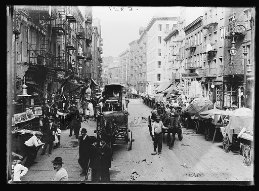 Italian neighborhood with street market, Mulberry Street, New York
