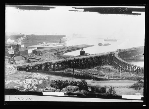Ore or coal docks and Anchor Line dock at the harbor, Marquette, Mich.