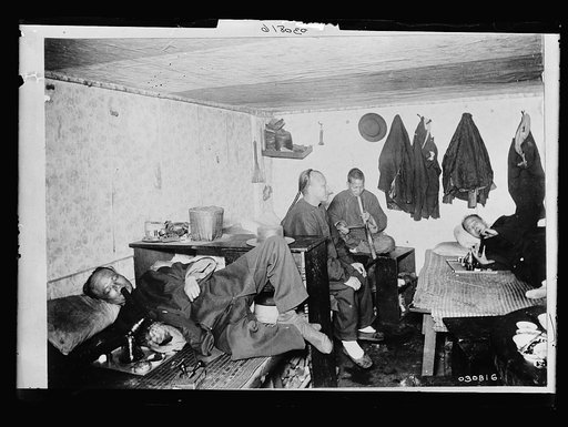 Chinese Americans in an opium den