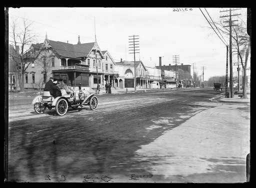 Street with Moesta's store and Fuller Savings Bank