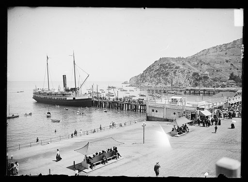 Steamship at pier by boardwalk, Avalon, Catalina Island, Calif.