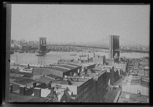 Warehouses and Brooklyn Bridge, East River, New York, N.Y.