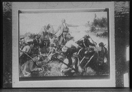 Military officer leading his men in a charge