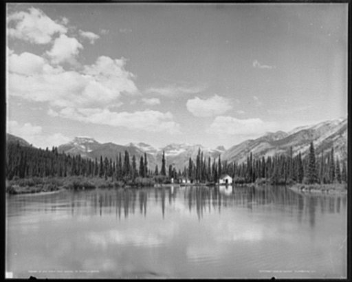 Up Bow River from bridge at Banff, Alberta, Canada