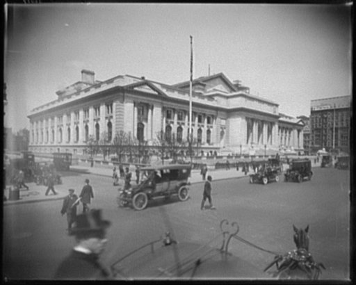 Street traffic in front of New York Public Library