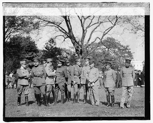 Military attaches at review of all American Detachment