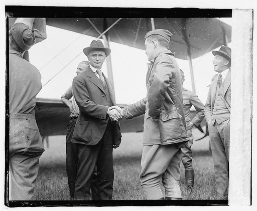 Maj. Scanlon, Commander at Bolling field, greets Mr. Lawson upon his arrival