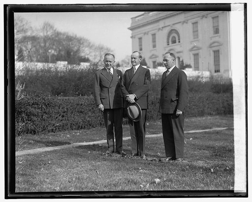 Coolidge and 2 men outside White House