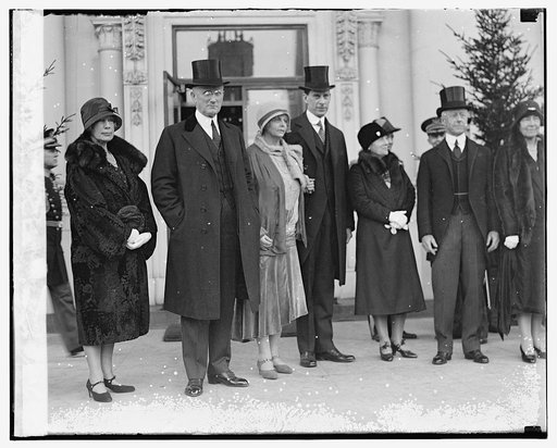 Sectys. Lamont, Wilbur, & Adams with wives, New Year Reception
