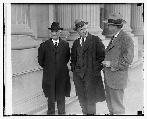 Charles Curtis, Will Rogers and an unidentified man, standing outdoors
