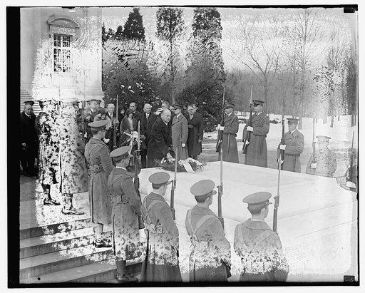 Visitors laying wreaths at the Tomb of the Unknown Soldier at Arlington National Cemetery