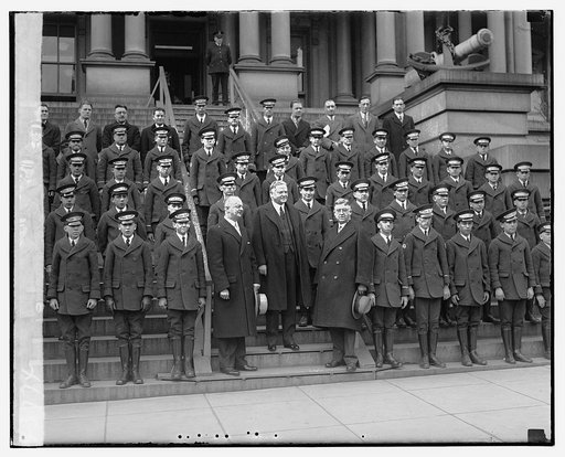 President Herbert Hoover and Western Union messangers from across the country who won a trip to Washington for their meritorious service, at the State, War, and Navy Building