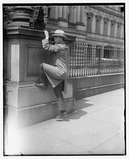 Unidentified photographer with camera