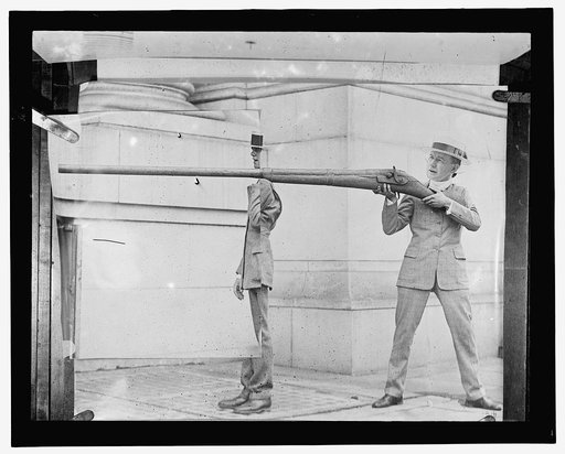 Photomontage with unidentified men and gun