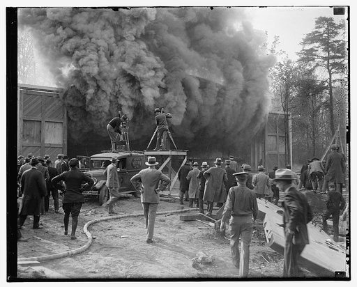 Photographing fire for news reels