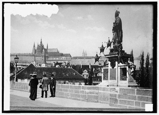 Germany, Prague. Statue to Patron Saint; Cathedral in background
