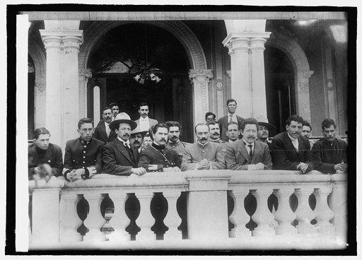 Mexico, Gov. Manuel Chas. & his aides on veranda of Terrazas home