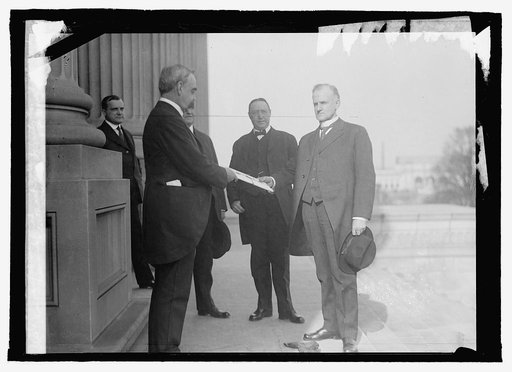 Sen. Saulsburg handing final electorial vote of Maine to Secty. To V.P. Marshall Sen. Fernand in C[...