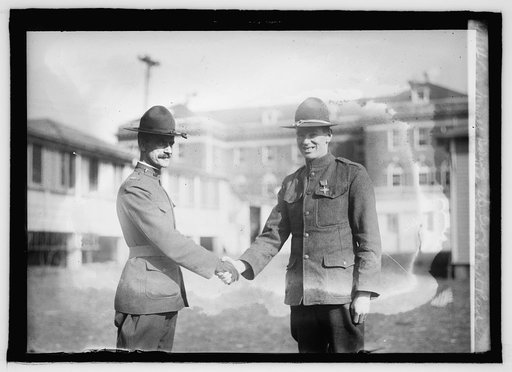 Corp. Newell B. Davis awarded the Cross of Honor at Walter Reed