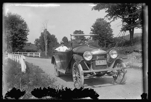 Automobile driving on country road