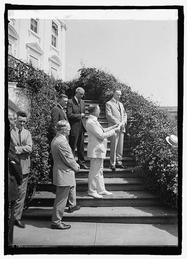 Coolidge and others on steps of White House, Washington, D.C.