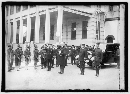 Military group salute with President Harding