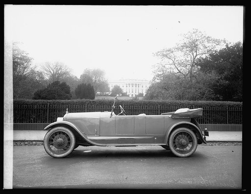 Duesenberg car [White House, Washington, D.C., in background