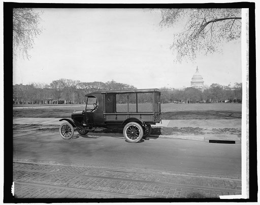 Ford Motor Co. new Ford body [U.S. Capitol, Washington, D.C., in background