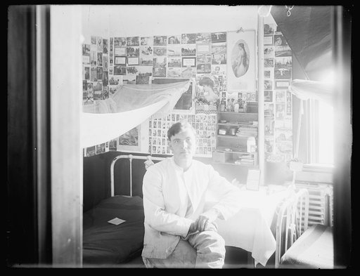 Young man in dormitory room
